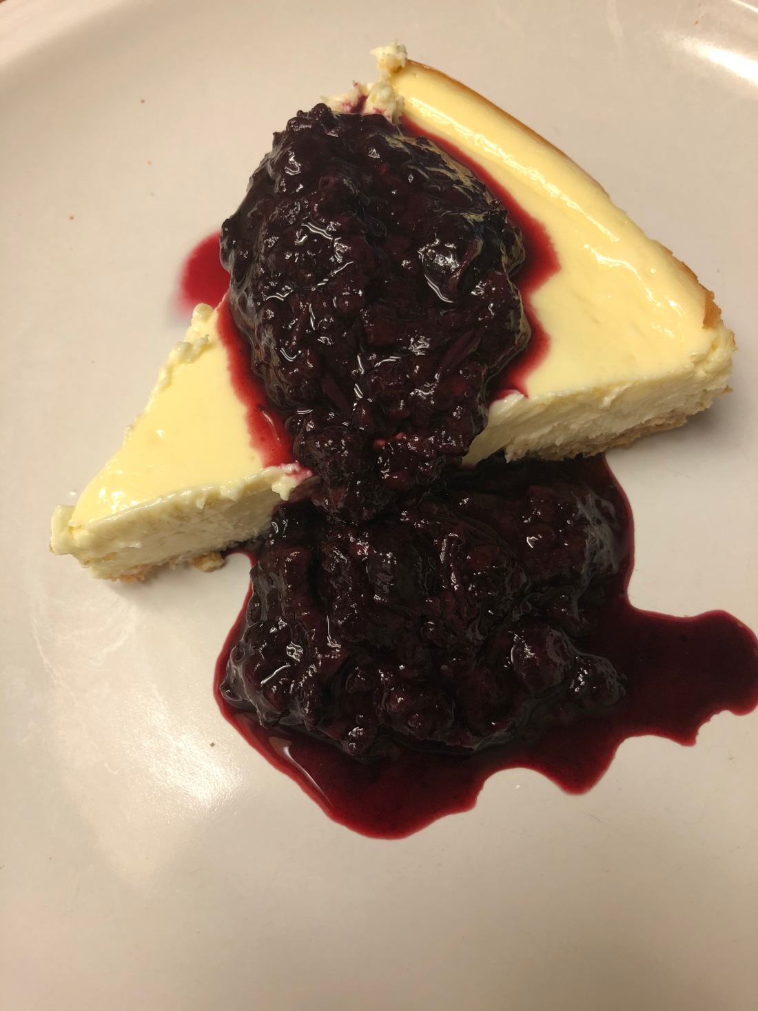 Homemade Cheesecake with Triple Berry Sauce